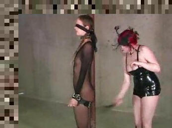 Submissive girl in body stocking takes abuse