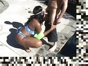 Ebony with saggy tits takes a cock by the pool