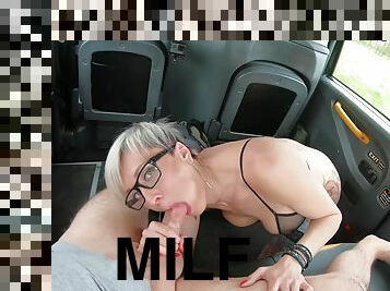Tattooed blonde gets ass fucked in the fake taxi backseat