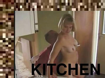 Frustrated blonde in the kitchen