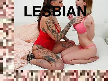 Giant lesbian deep kisses and dominates smaller lesbian 2