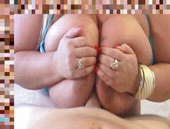 BBW with enormous tits is giving a spicy titjob