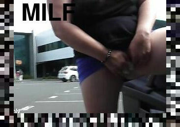 NZ Trashy MILF slut public pissing in the bus stop in full view of traffic & public