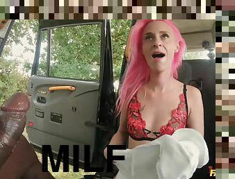 Blue-eyed MILF with freaky pink hair goes black in the taxi cab!