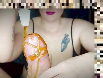 Busty Australian Babe Sucking on her Honey Covered Big Dick