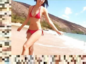 Slow motion Japanese ass in a bikini on the beach