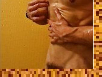Boy a little too excited by his oiled body cums hard after rough handjob