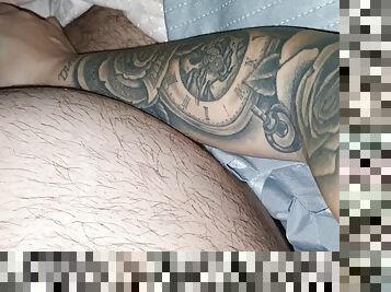 Tattooed stepmom jerks off stepsons cock, making him feel like a king