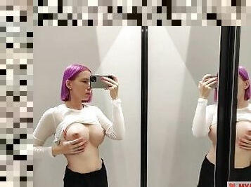 Try on haul transparent clothes in the fitting room. Busty blonde tries on a transparent blouse in o