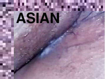 Mixed Asian girl dripping cream