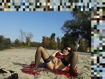Naked girl masturbate on the beach part2