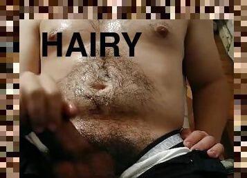 Hairy man cums all over his oily body after a long day