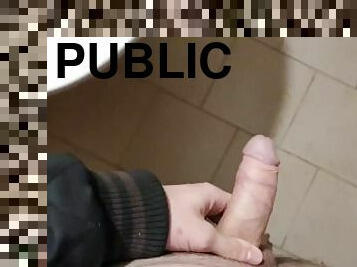 Young guy's risky wank in a public toilet