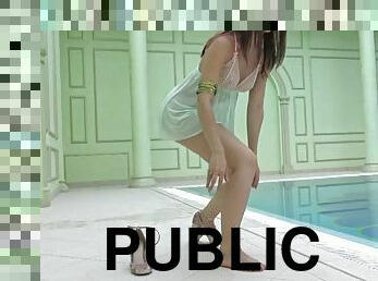 The sexiest petite teen Lizi Vogue swims naked in the pool