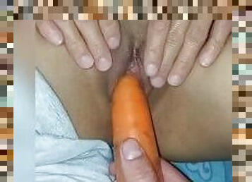 I want his cock and it hasn't arrived yet I'll have to use this carrot in my wet pussy