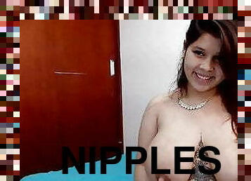 Cute chubby Colombian milks her long nipples on cam