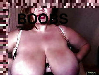BBW Ines fondles her gigantic boobs and licks nipples