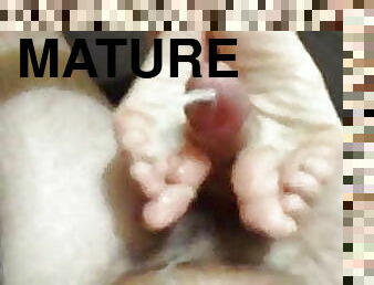 Footjob from neighbour mature