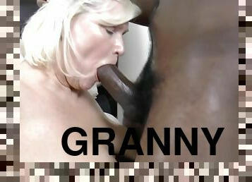 Sexy granny gives perfect footjob to a black cock