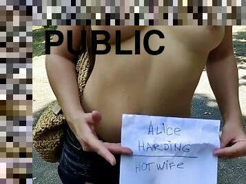 Alice sunbathing topless on a public beach, playing with tits and a toy, and pissing