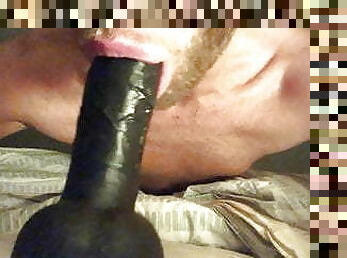 Sucking black dildo 