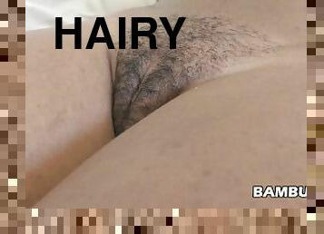 Close up hairy black cunt fileld up with hot cream