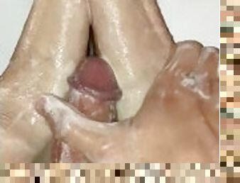 Soapy feet and cock