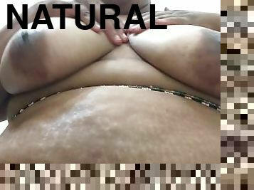 Brownskin BBW rubs lotion on big Natural breasts and Shaved pussy ????