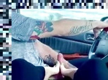 Giving daddy a footjob while he drives