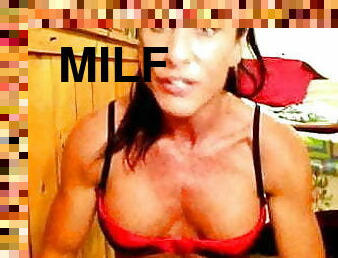 Muscle Milf flexing pecs