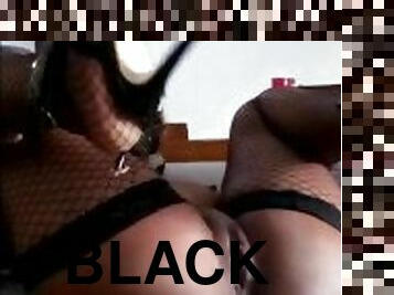 Black girl with heels and fishnet