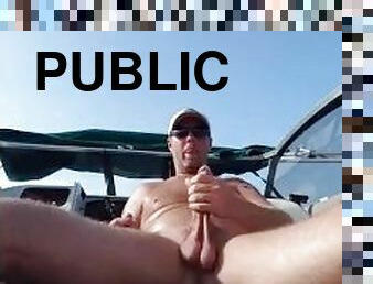 Jerking big cock on boat