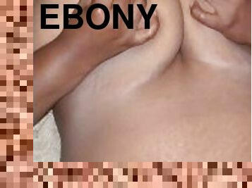 Thick Ebony milf suck own tits