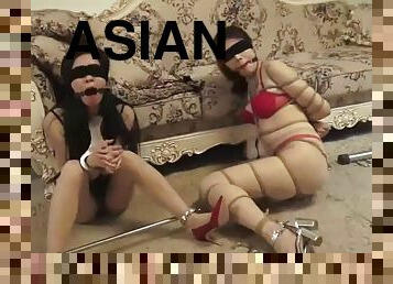 Asian Women Chained In Metal