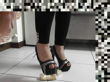 Crushing crackers in high heels (visual 2)