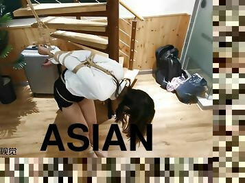 Asian Teacher Suspended And Table Tied