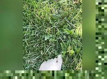 Pretty feet playing in grass