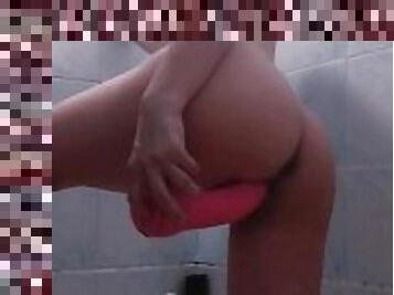Beauty masturbates with a dildo in the bathroom until the end