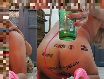 Sissy in micro bikini and pink heels taking an anal beer