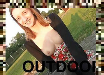 Sexy teen girl Ria shows her perky tits outdoor