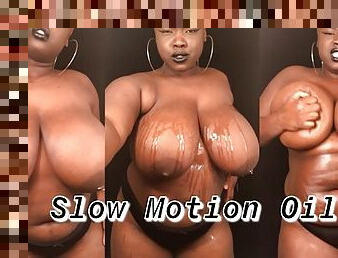 Slow Motion of BBW Rubbing Oil on Natural Black Tits & Curvy Body