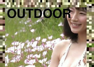 Riho Yoshioka - erotic outdoor video of big tits Asian in bikini on the beach