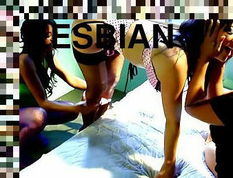 Three brunette lesbians orgasm together in fishnet stockings