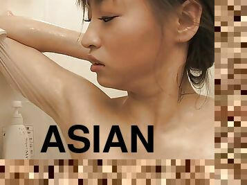 Sweet Asian shaves her pussy in the shower after sex interview