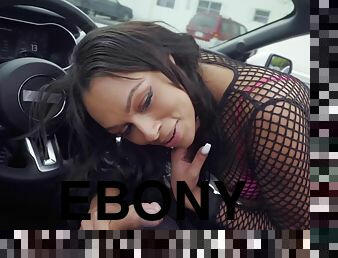 Hot ebony cutie Bethany Benz blows cock in the car