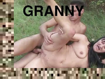 Lascivious granny dicked in nature by young stud
