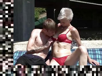 Pixie grandma swallows young cock beneath bridge