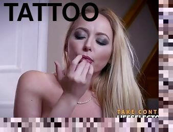 Blonde with a tattooed back fucked on camera
