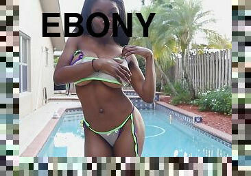 Super cute ebony teasing his fans by the pool
