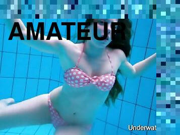 Sexy girl shows beautiful young underwater body
